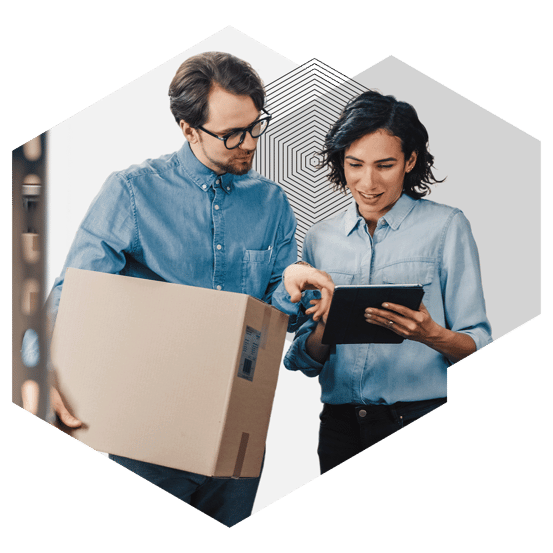 two professionals manage warehouse logistics